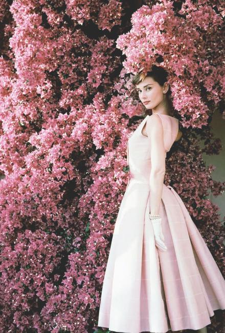 Audrey Hepburn in a Givenchy pink cocktail dress, 1955.